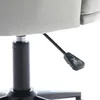 A close-up view of the height adjustment lever on an office chair. Produktbild-Vorschau