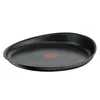 A black frying pan with a red indicator in the center, isolated on a white background. Náhled obrázku produktu