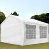 A white party tent with arched windows is set up on a grassy lawn with trees and a blue sky in the background. Anteprima dell’immagine prodotto