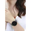 A woman wearing a smartwatch on her wrist. Náhled obrázku produktu