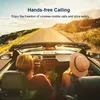 A couple driving in a convertible on a sunny road. Produktbild-Vorschau