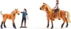 Two toy figures of a girl and a horse, one girl is riding a horse, and the other is standing next to a foal. Náhled obrázku produktu