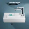 A close-up view of a white ceramic sink with a chrome faucet, against a blue background. Text indicates a measurement. Anteprima dell’immagine prodotto