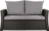 A front view of a dark gray rattan two-seater sofa with gray cushions. Produktbild-Vorschau