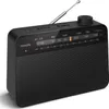 A black Philips portable radio is shown from a slightly elevated front-left angle against a light gray background. Voir les images du produit