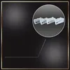 Four white plastic clips are shown within a circle on a black background with gold border accents. Produktbild-Vorschau
