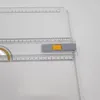 A close-up view of a drafting board with rulers and a protractor. Náhľad obrázku produktu