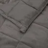 A close-up view of a folded gray weighted blanket. Produktbild-Vorschau