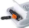 A close-up view of a white mini cooler box with a black power cord and a car adapter plugged in. Produktbild-Vorschau