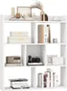 A white bookshelf filled with decorative items and books. Podgląd zdjęcia produktu
