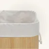 Close-up of the top part of a bamboo laundry basket with a fabric liner. Podgląd zdjęcia produktu