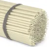 A bundle of thin white candles tied with a grey string. Produktbild-Vorschau