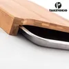 Close-up of a bamboo cutting board with a stainless steel tray. Náhľad obrázku produktu