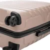 A close-up view of a beige suitcase, focusing on the wheels and zipper. Náhled obrázku produktu
