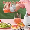 A person is pouring a pink smoothie from a portable blender into a glass, with sliced kiwi and pastries on the table. Produktbild-Vorschau