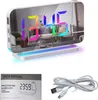A digital alarm clock with a mirrored surface displaying colorful time and a room scene, shown with its user manual and charging cable. Produktbild-Vorschau