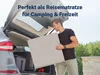 A man loading a folded mattress into the trunk of a car. Produktbild-Vorschau