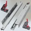 A close-up of drawer slides with red plastic mounting parts, against a light gray background. Anteprima dell’immagine prodotto