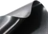 A close-up, abstract view of a black flexible material, possibly a pond liner, folded and curved. Produktbild-Vorschau