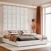 A bedroom scene with a large upholstered headboard, bed, pillows, and curtains. Anteprima dell’immagine prodotto