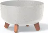 A white speckled planter pot with three brown legs, shown from a front-side angle on a white background. Náhľad obrázku produktu