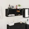A black wall-mounted cabinet in a bathroom setting, with towels and toiletries displayed. Anteprima dell’immagine prodotto