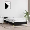 A black bed frame with a mattress and bedding is shown in a room with a nightstand and a plant. Náhled obrázku produktu