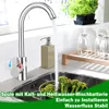 A kitchen sink with a faucet running water into it, where broccoli is being rinsed. There are glasses on a drying rack in the background. Anteprima dell’immagine prodotto