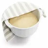 A white mixing bowl with dough covered by a striped towel. Náhľad obrázku produktu