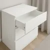 A white dresser with one drawer open, shown from a slightly elevated angle. Produktbild-Vorschau