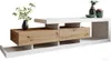 A modern TV lowboard with wooden drawers and white accents, displayed against a white background. Náhľad obrázku produktu