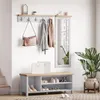 A hallway or entryway with a shoe bench, coat rack, and mirror. Voir les images du produit