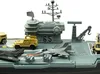 A toy aircraft carrier with various toy vehicles and aircraft on its deck. Náhľad obrázku produktu