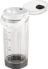 A white and transparent portable blender with a gray base and a white handle, shown with its lid open. Podgląd zdjęcia produktu