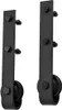 Two black metal sliding door rollers with bolts against a white background. Anteprima dell’immagine prodotto