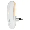 A white plug-in night light with a motion sensor is shown against a white background. Podgląd zdjęcia produktu