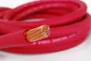 A close-up of a coiled red cable with its copper core exposed. Podgląd zdjęcia produktu