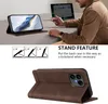 A person is using a phone case as a kickstand while working on a laptop. Produktbild-Vorschau