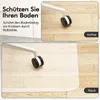A split image showing a chair caster on a wooden floor before and after using a protective mat. Produktbild-Vorschau
