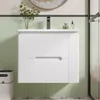 A modern white bathroom vanity with two drawers is mounted on a wall with light green tiled backsplash. Produktbild-Vorschau