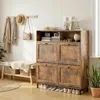 A hallway or entryway with a shoe cabinet, bench, and coat rack. Produktbild-Vorschau