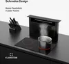 A modern kitchen countertop with a built-in induction cooktop and a pop-up range hood. A pot of boiling water is on the cooktop, and steam is rising into the hood. Produktbild-Vorschau