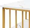 A close-up view of a white marble-effect tabletop with gold-colored metal supports. Náhľad obrázku produktu