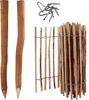 A collection of wooden fence posts, fence panels, and metal staples. Produktbild-Vorschau
