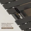A close-up view of a heated towel rack with a remote control and its internal circuitry visible. Produktbild-Vorschau