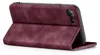 A burgundy flip case for a smartphone is shown from a side-angle, with the front cover folded open. Produktbild-Vorschau