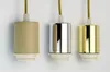 Three pendant light sockets with different finishes (beige, chrome, and gold) are shown against a white background. Produktbild-Vorschau