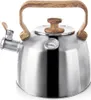 A stainless steel kettle with a wooden handle and lid knob, featuring a built-in thermometer. Voir les images du produit