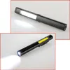 Two views of a black pen-style LED flashlight, one showing a wide COB light and the other a focused beam. Náhľad obrázku produktu