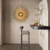 A modern interior scene with a wall lamp, a bar stool, and a shelf with decorative items. Anteprima dell’immagine prodotto